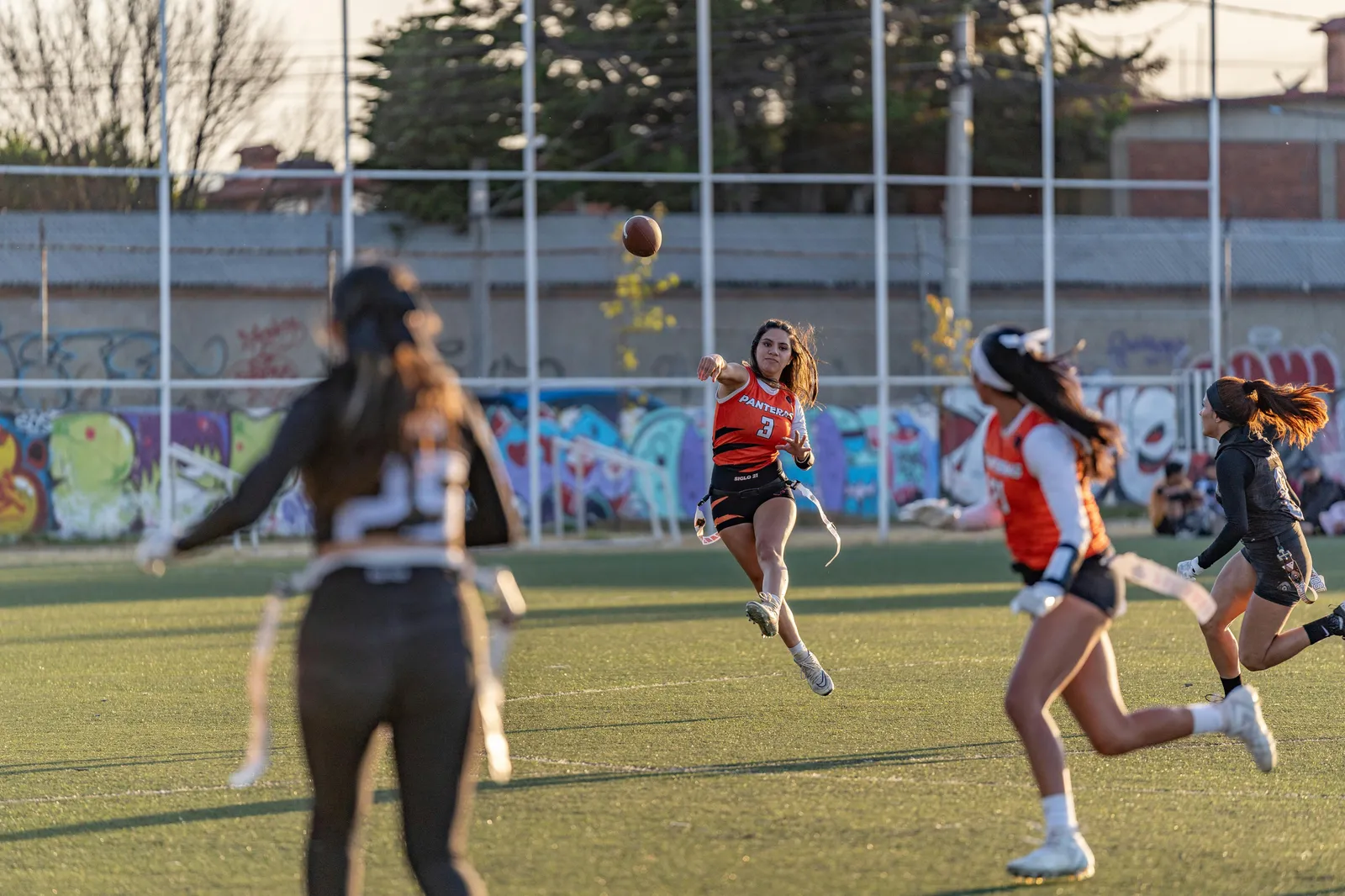 Girls flag football in stadium
