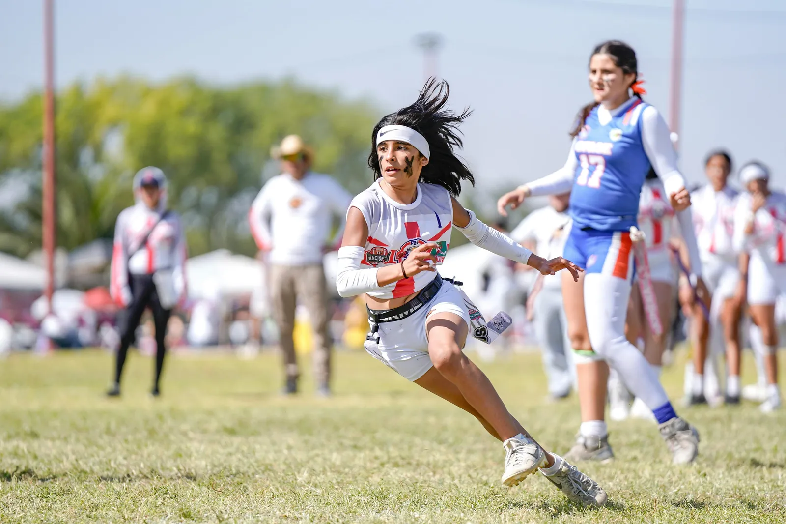 Girls flag football game under the lights