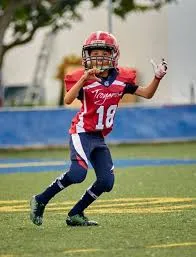 Young football player on the field